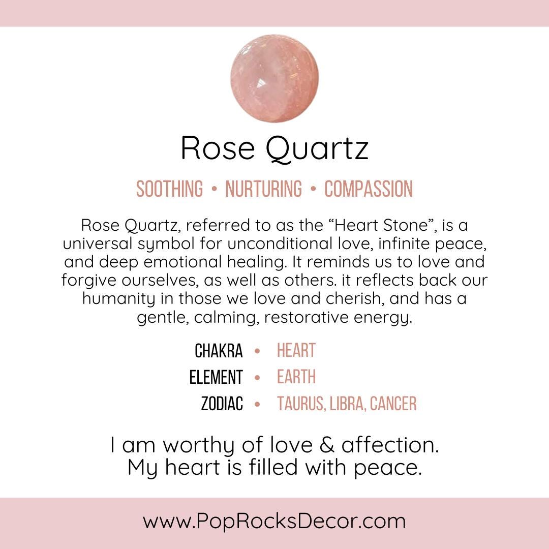 a pink rose quartz stone on a white background