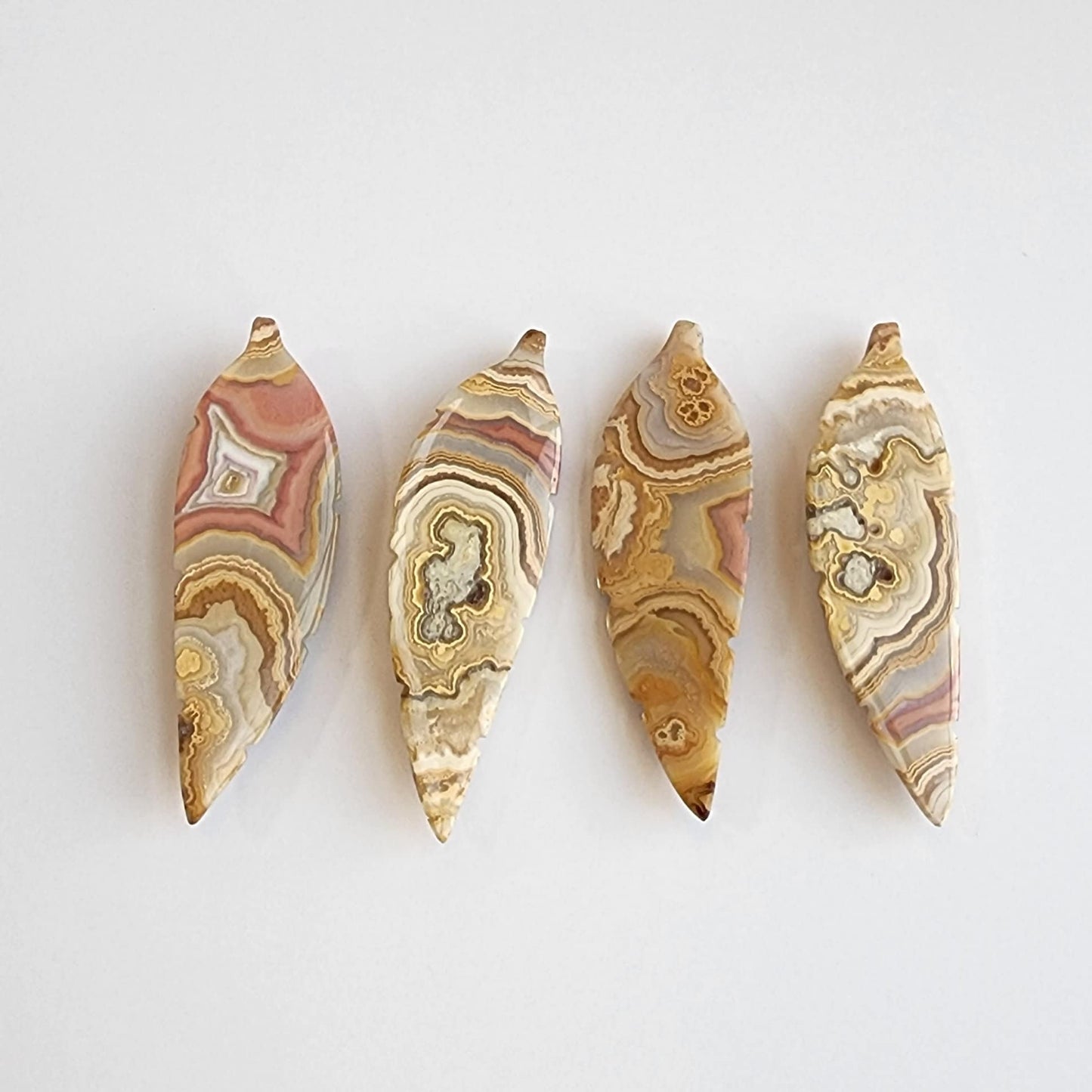 Crazy Lace Agate Feather Carving: Banded Crystal Stone