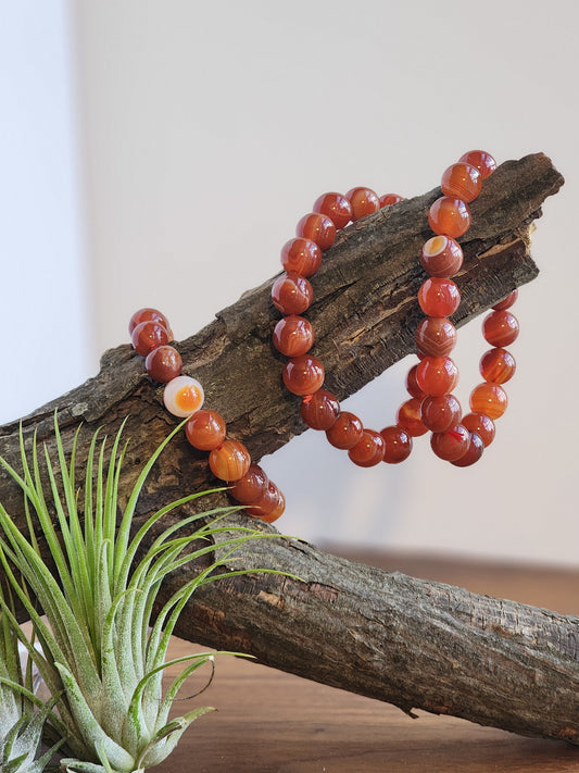 Gorgeous high quality carnelian crystal bracelets with eyes and banding.