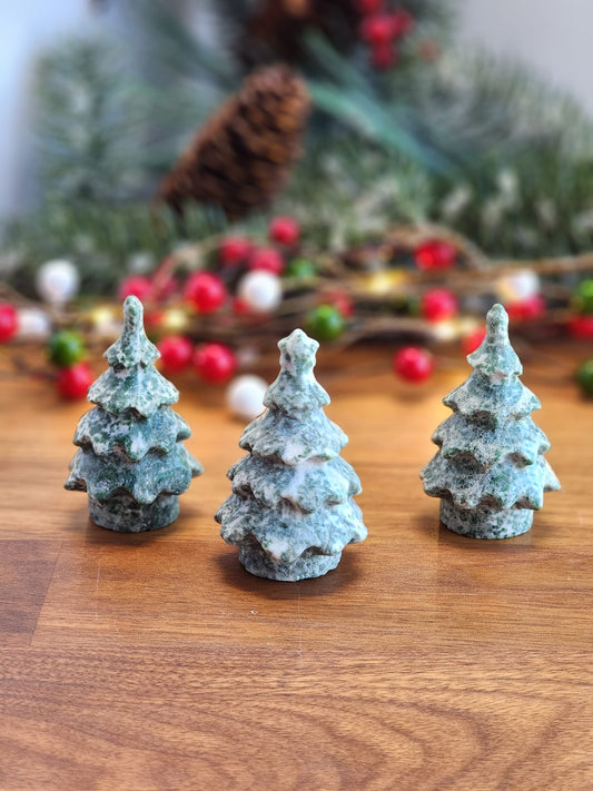3D Crystal Christmas Trees. Green spotted crystal carvings for the holidays or winter decor.