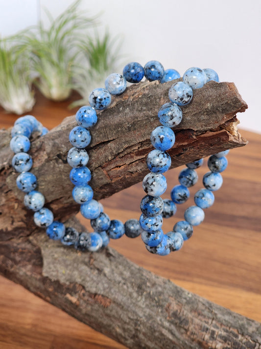 Blue spotted K2 Crystal Bracelets, gorgeous mix of blue and black hue bead crystals on stretchy bracelet.