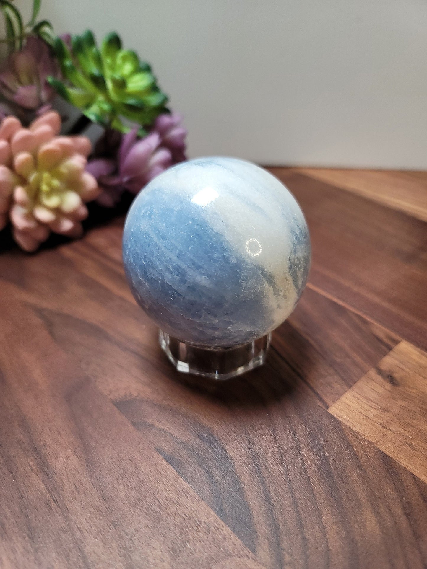 Blue Calcite Sphere: 69mm Crystal with White Quartz Swirls