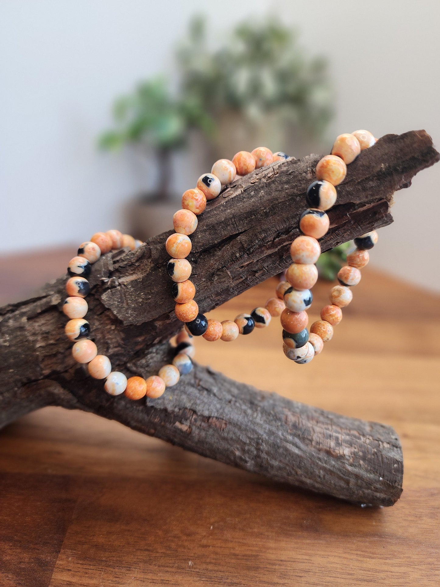 Orange Dream Black Agate Crystal Bracelet | 8MM Agalmatolite Beads | Orange, Black, White | Halloween Jewelry for Spooky Season & Summerween