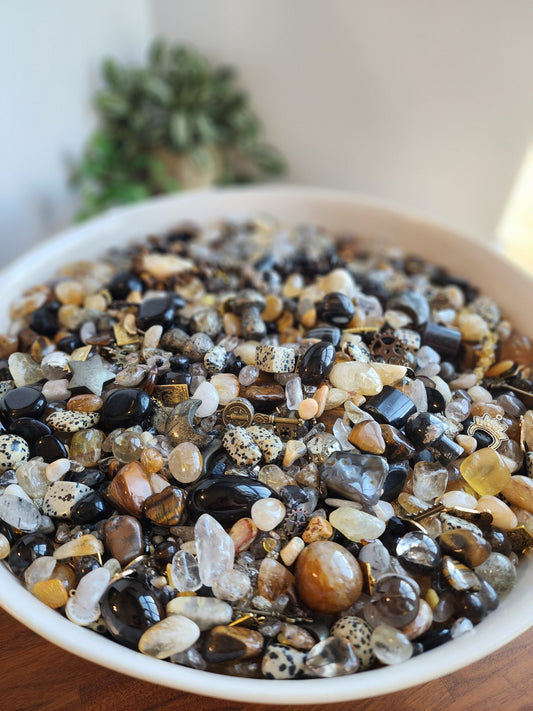 Gold Manifestation Crystal Confetti is here for 2024! Bring in the new year with a scoop of health, wealth and golden happiness. Lots of black for protection, citrine for wealth, clear quartz for clarity, and pyrite for good decisions.Mix Scoops.