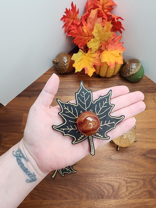 Maple Leaf Crystal Sphere Stand. Beautiful etched detail holder with black finish. Perfect for Autumn or fall decor. Can hold spheres ranging from 20mm up to about 80mm.