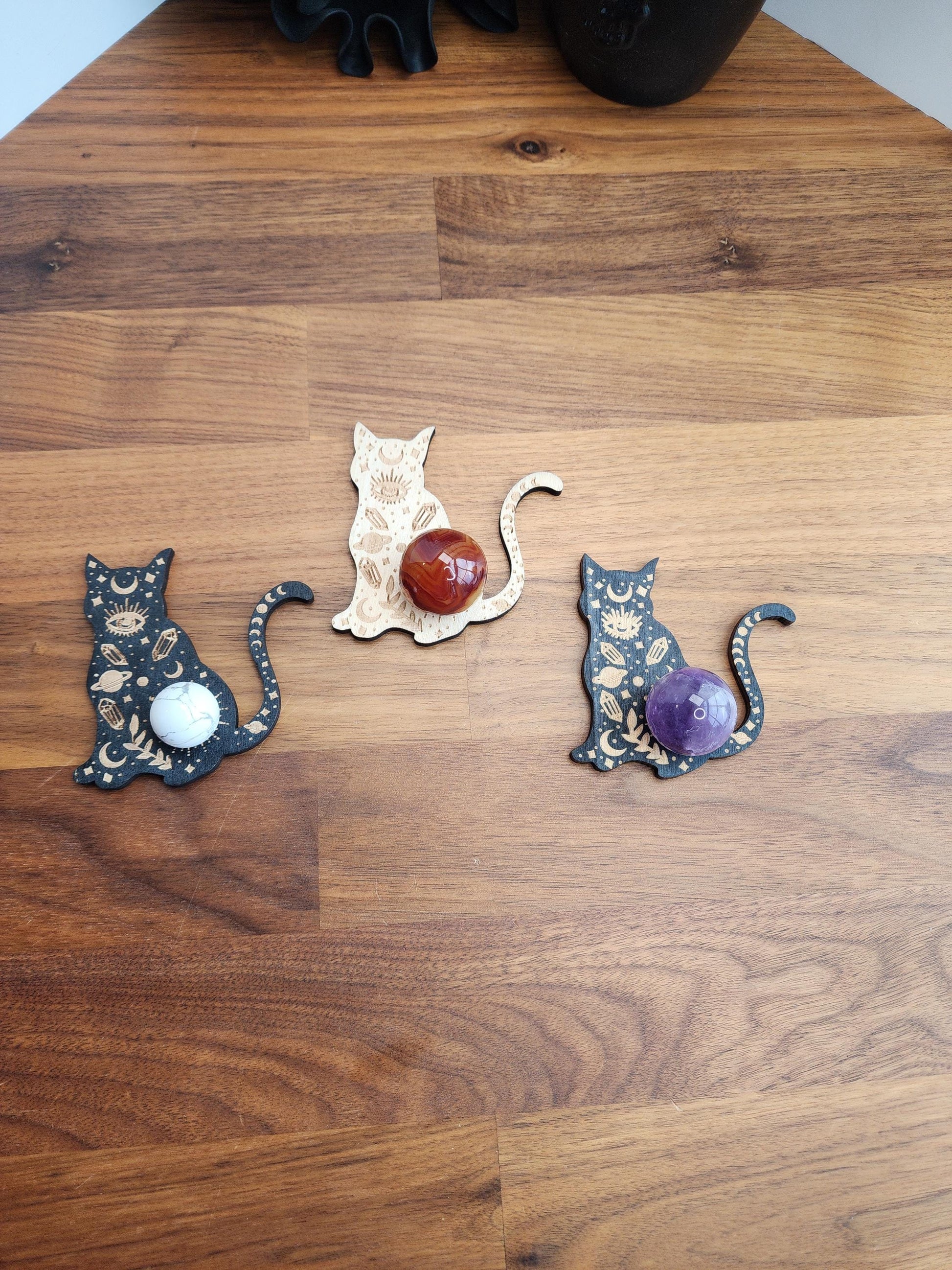 Crystal Sphere Stand: Protective Evil Eye Cat Motif with Crystal Gems and Planets | Black or Natural Etched Wood