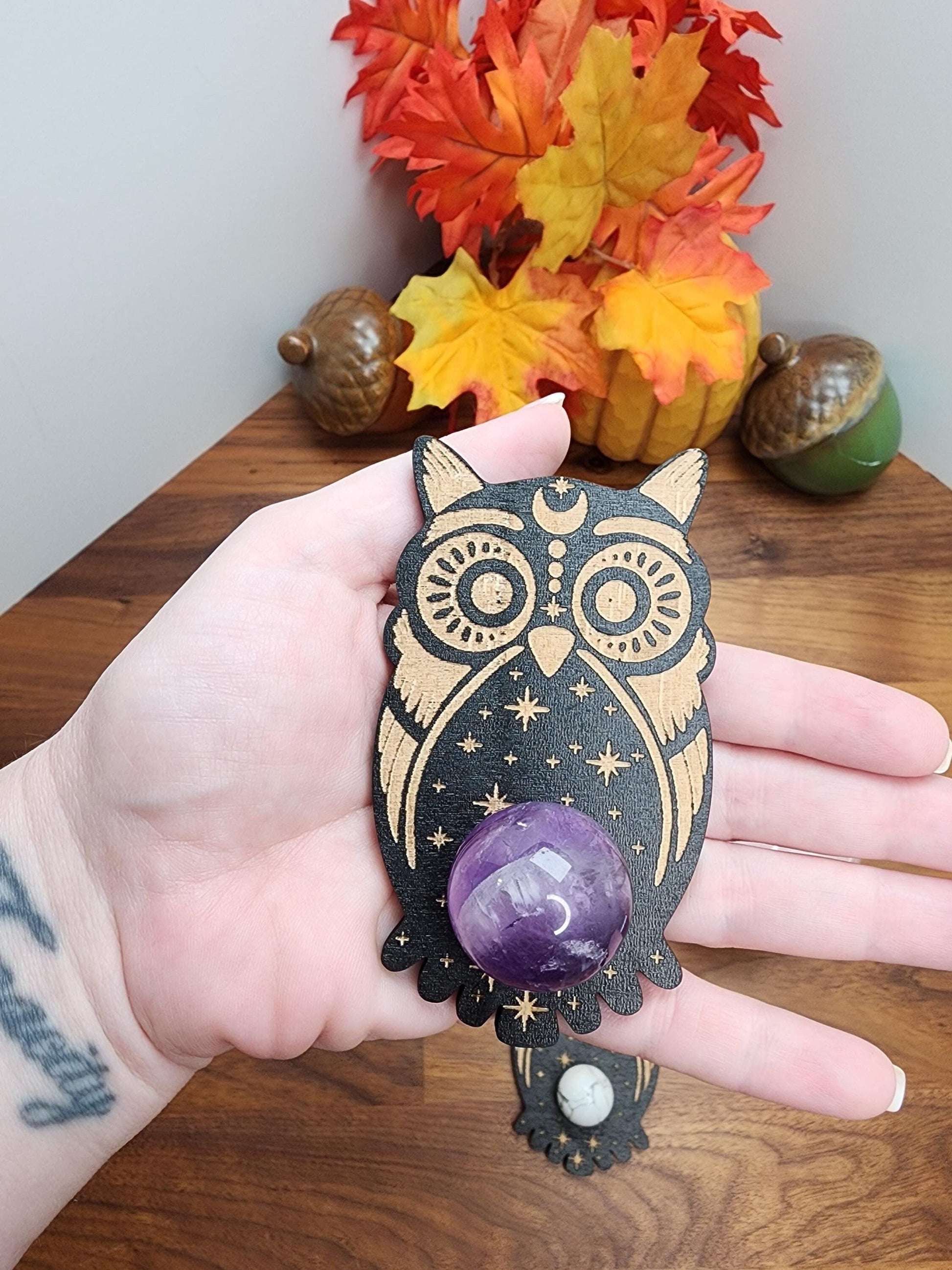 Celestial Wise Old Owl crystal sphere stand. Etched into natural wood with black finish and adorable detail. Can hold spheres from 20mm to about 75mm.