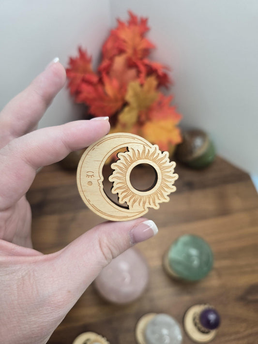 Sleepy Celestial Moon face with a blazing sun. Mini Crystal Sphere holder.