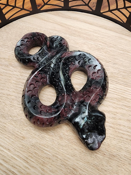 Fireworks Garnet Snake | 4.5" Crystal Serpent Carving | Ruby Red embedded in black Astrophyllite blue flash | Spooky Season | Scarlet Witch