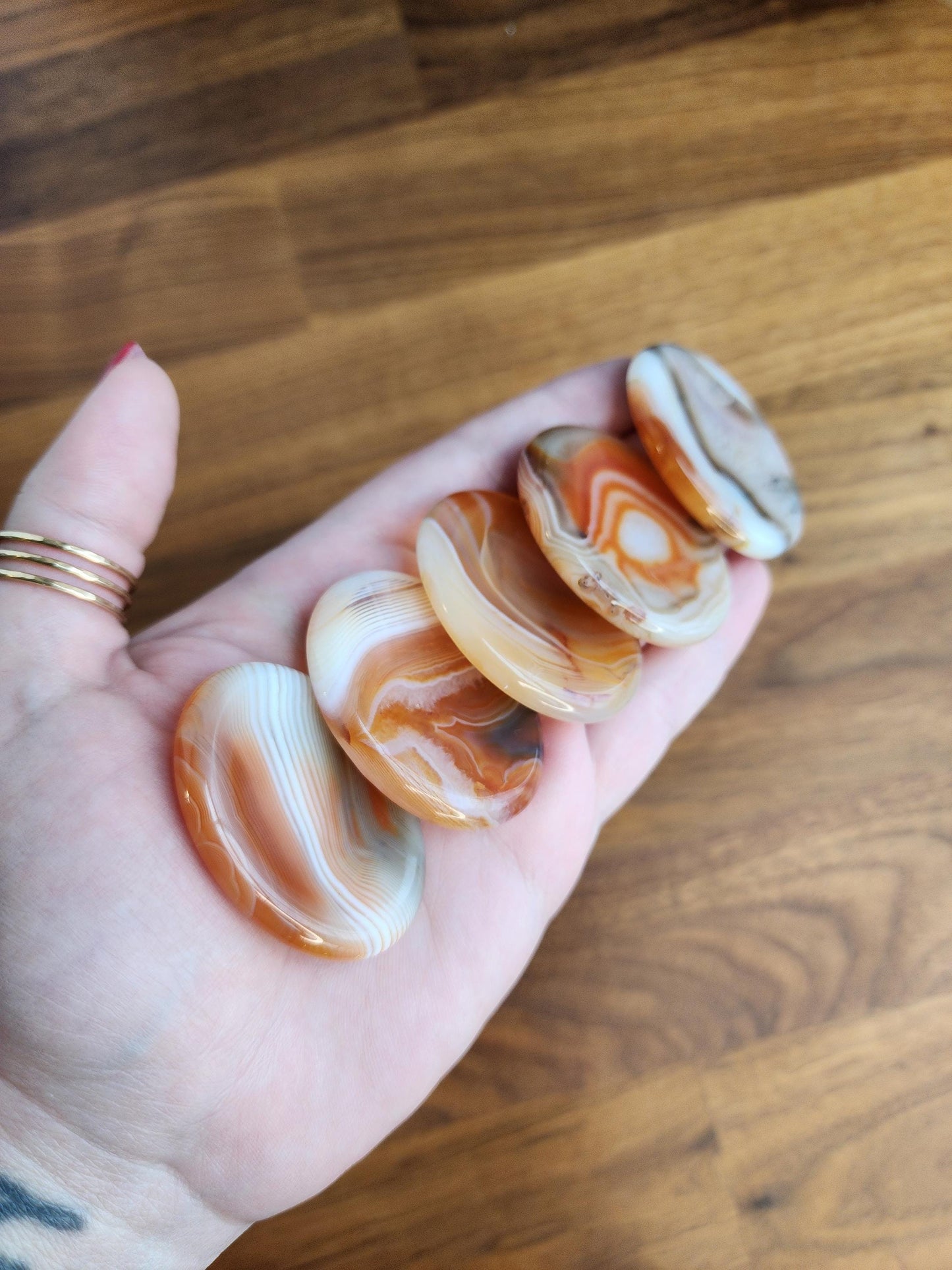 Banded Agate Worry Stone: Red, Orange, and Gray Crystal Fidget (1.77")