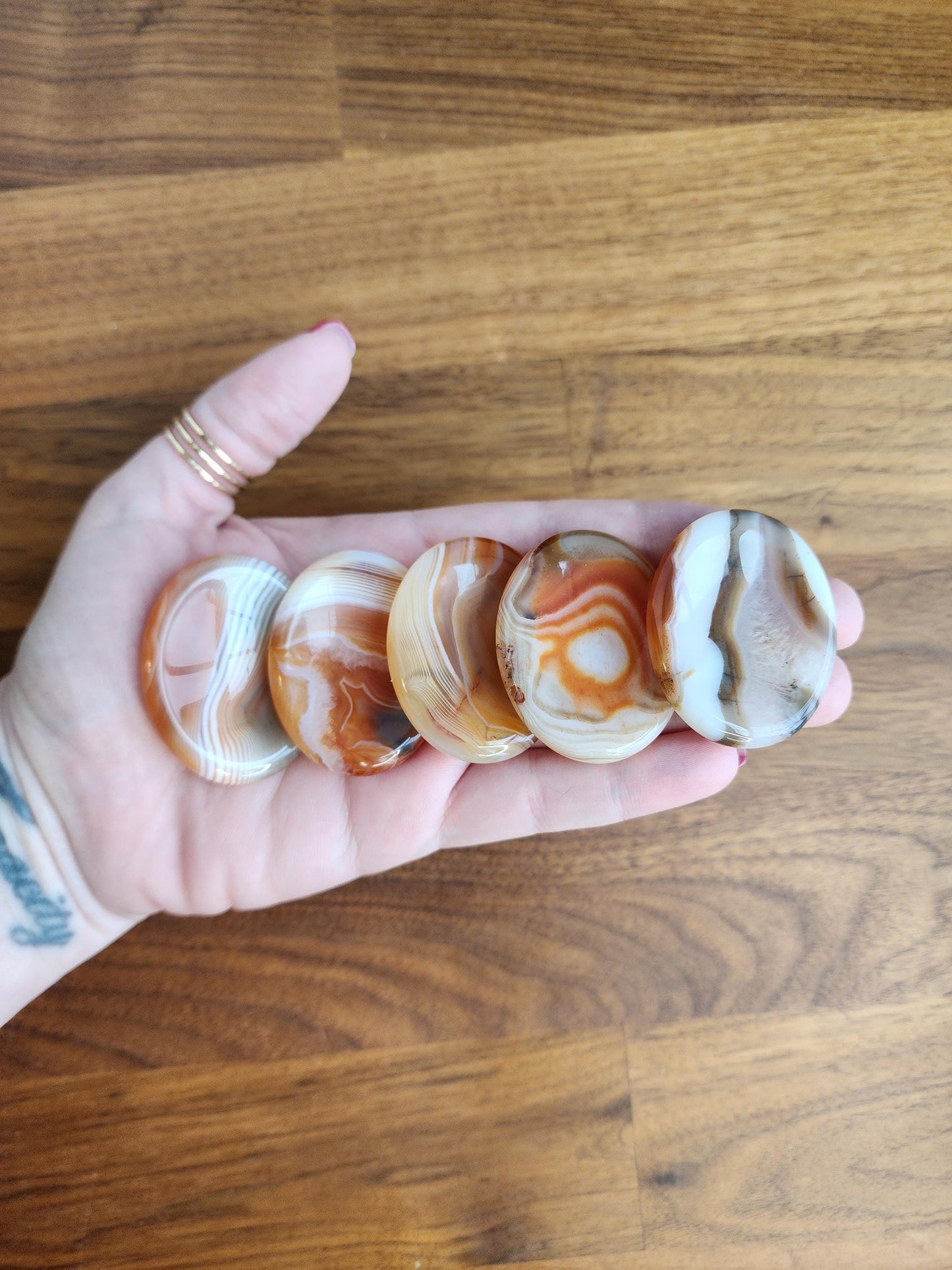 Banded Agate Worry Stone: Red, Orange, and Gray Crystal Fidget (1.77")