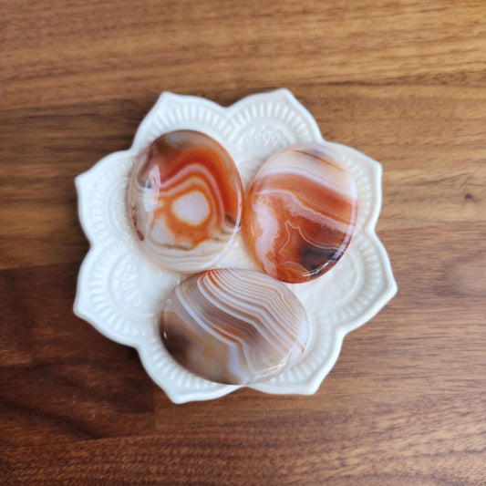 Banded Agate Worry Stone: Red, Orange, and Gray Crystal Fidget (1.77")