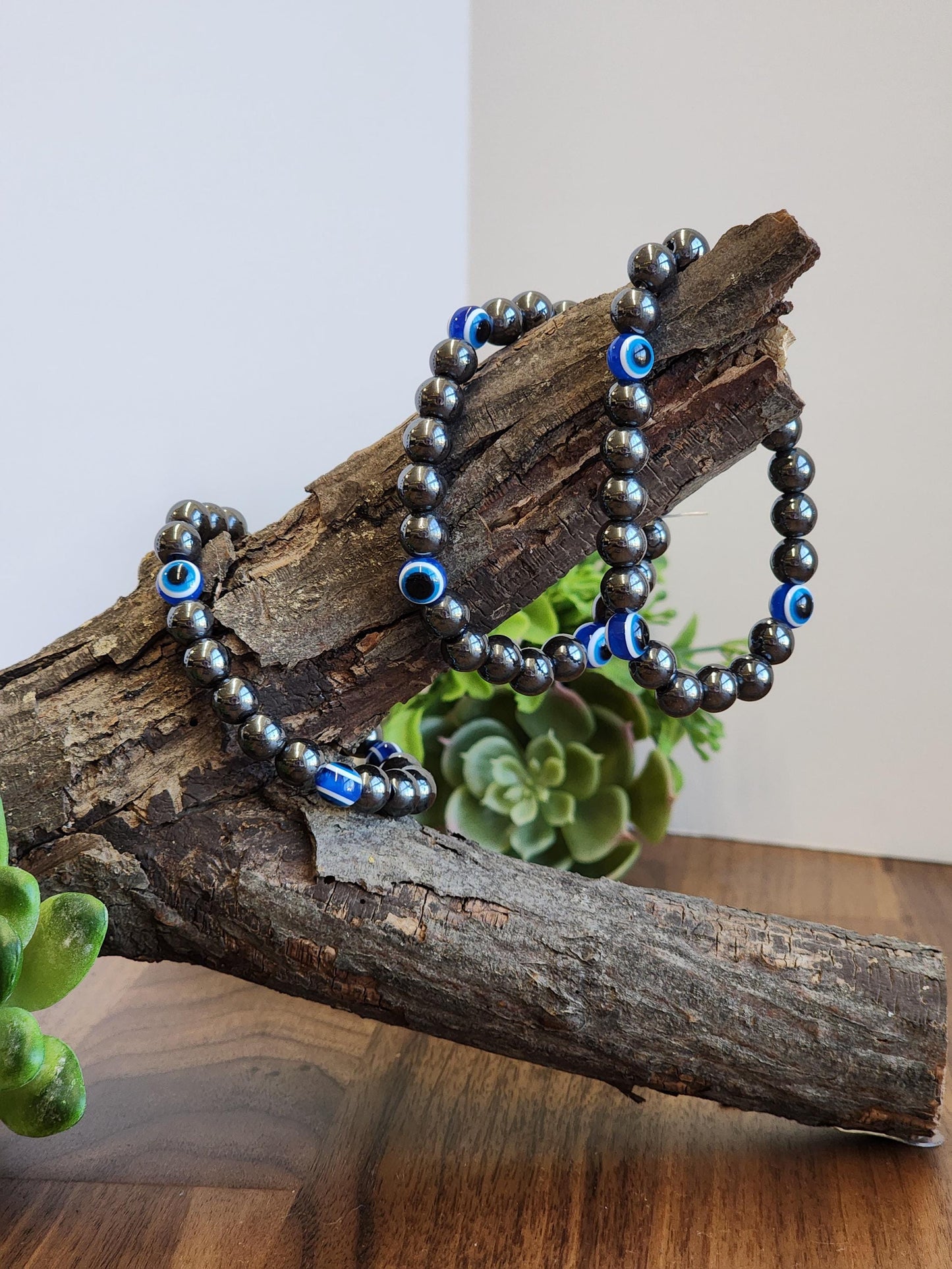 Evil Eye Hematite Bracelet: 8MM Tera Hertz Beads with Blue & Black Protection Charms