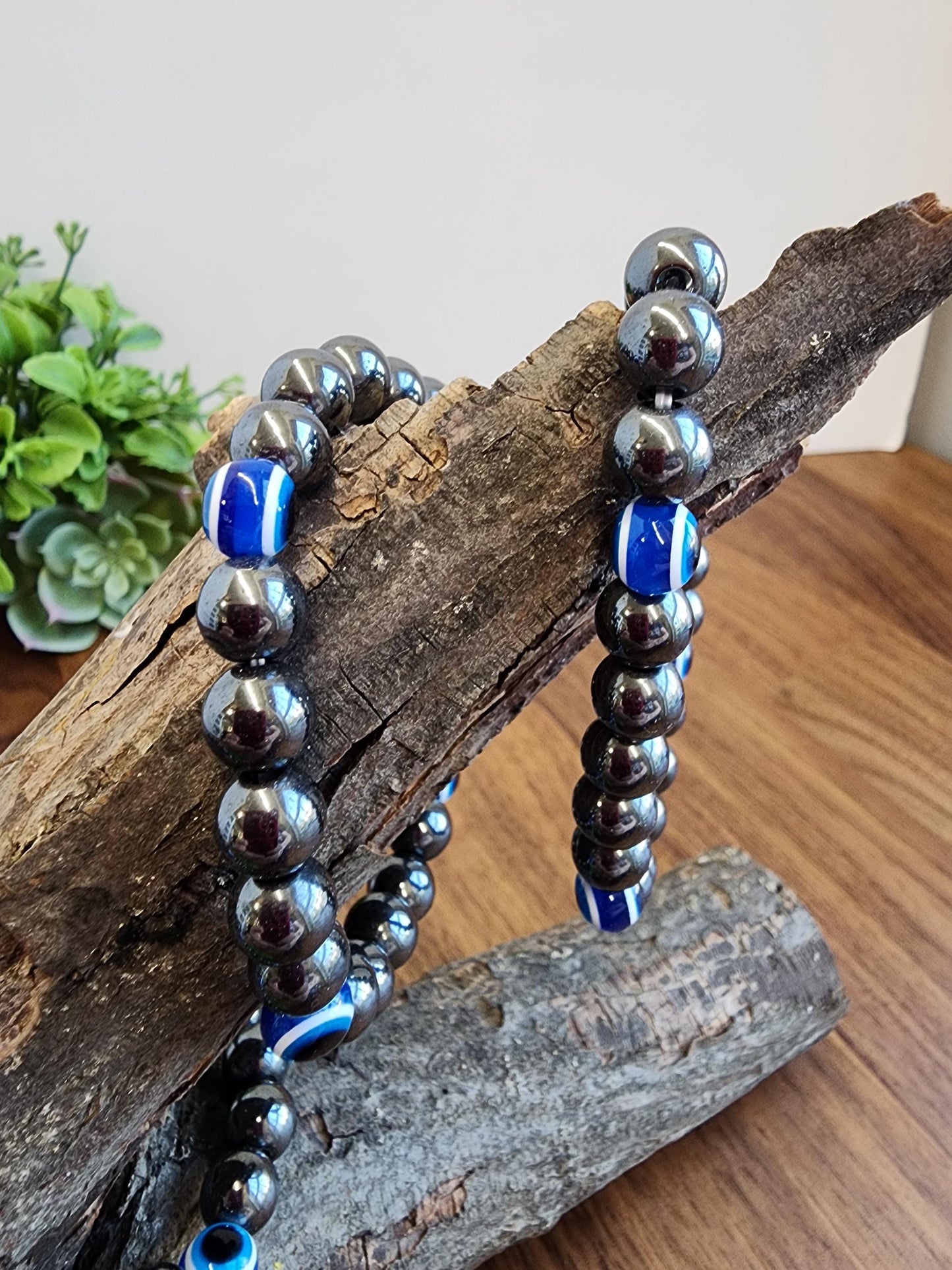 Evil Eye Hematite Bracelet: 8MM Tera Hertz Beads with Blue & Black Protection Charms