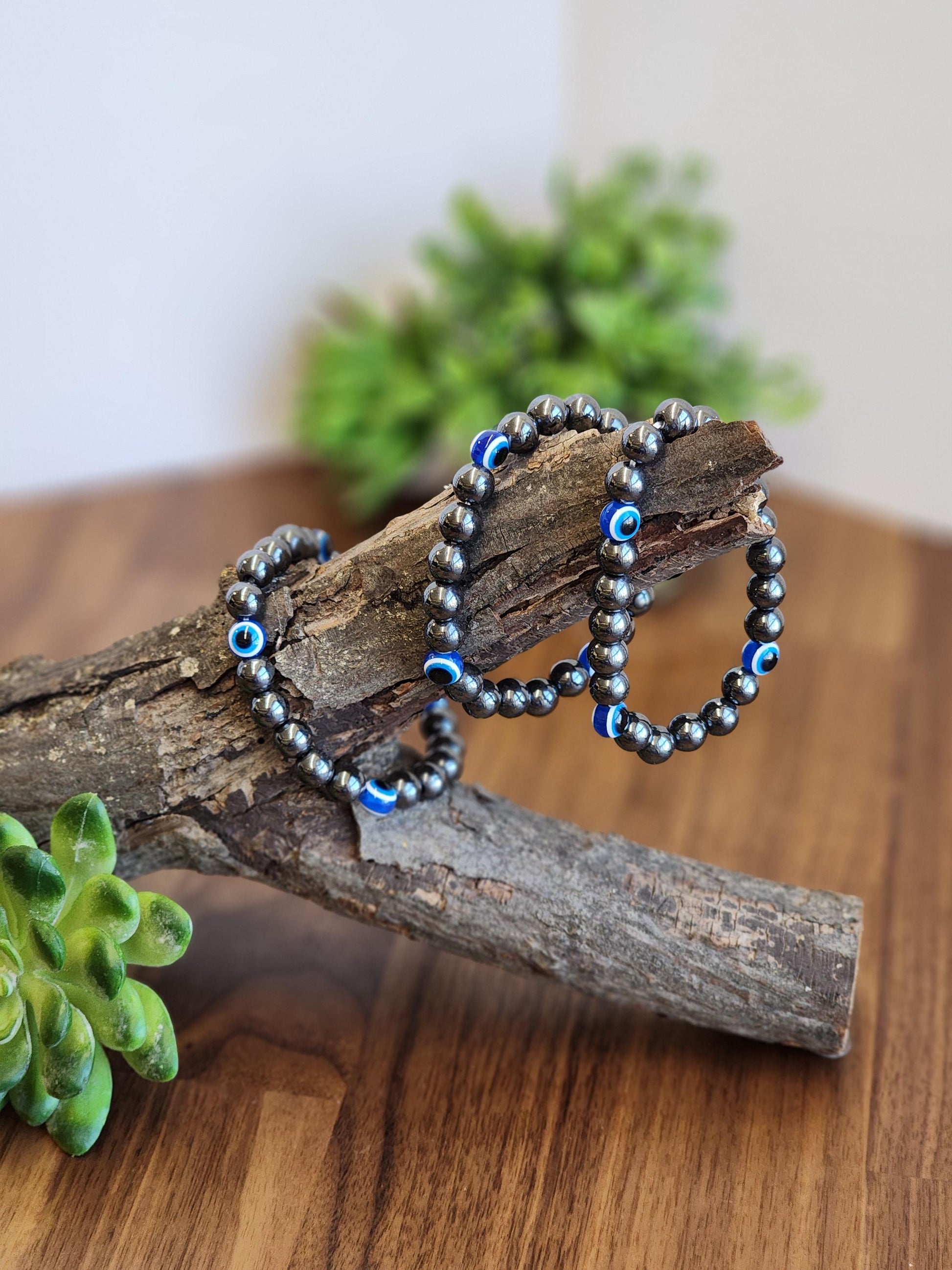 Evil Eye Hematite Bracelet: 8MM Tera Hertz Beads with Blue & Black Protection Charms
