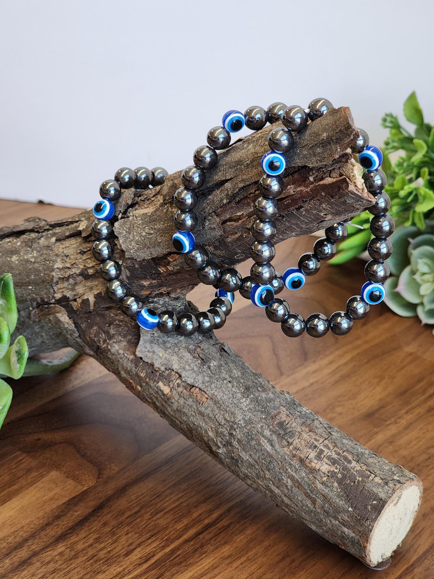 Evil Eye Hematite Bracelet: 8MM Tera Hertz Beads with Blue & Black Protection Charms