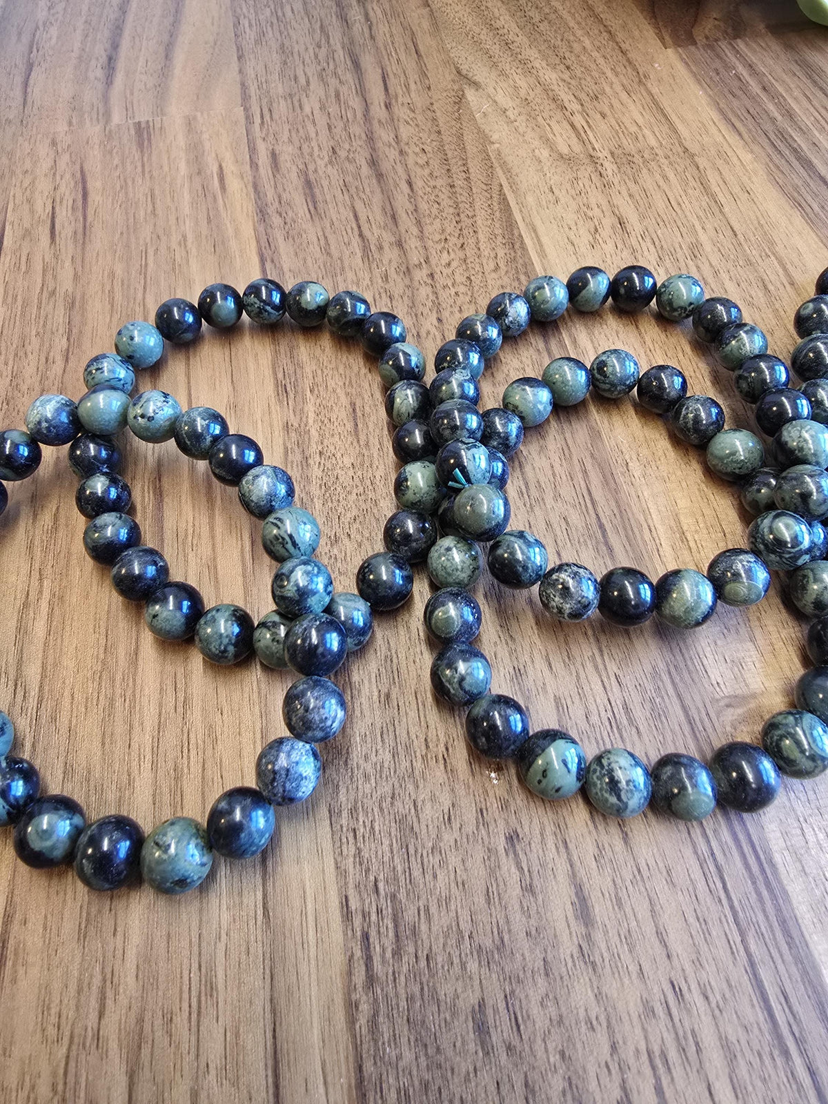 Inv - Kambaba Jasper Bracelet: 8MM Dark Green Crystal Beads | Evil Eye patterns and swirls in deep Forest Colors | Subtle gift for him