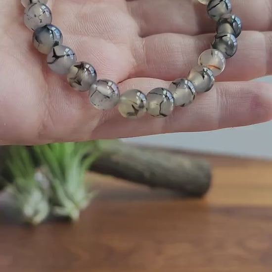 Inv - Dragon Lace Agate Bracelet: 7.5MM Translucent Blue Crystal with Black Veins and Webbing | Cloudy Gray Patterned Jewelry | Goth Vibes