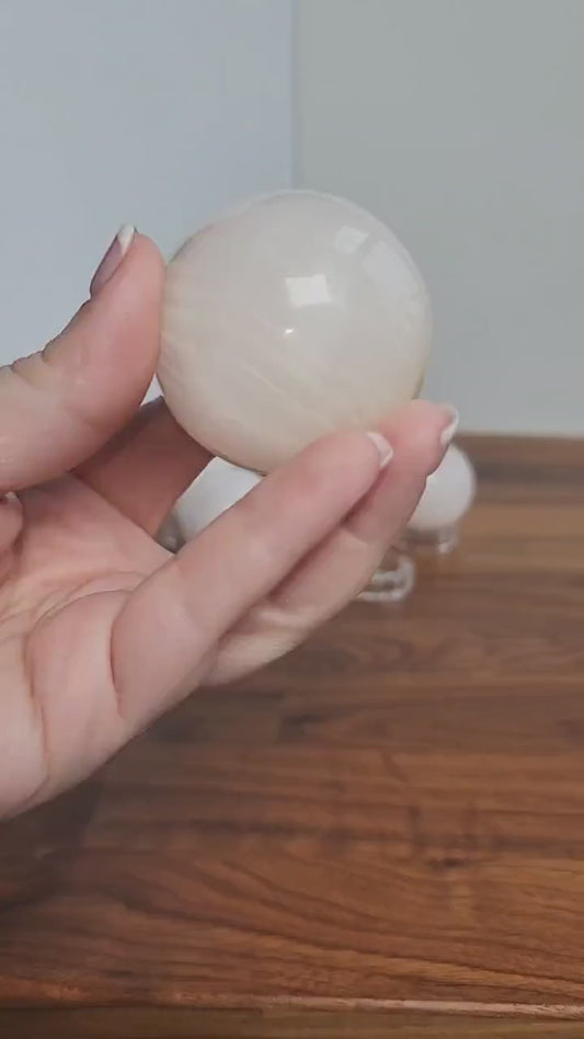 Pink Mangano Calcite Sphere: UV Reactive Crystal, Heart Chakra