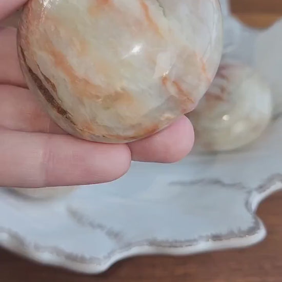 Cream Moonstone Palm Stone: Flashy Peach Pocket Stone