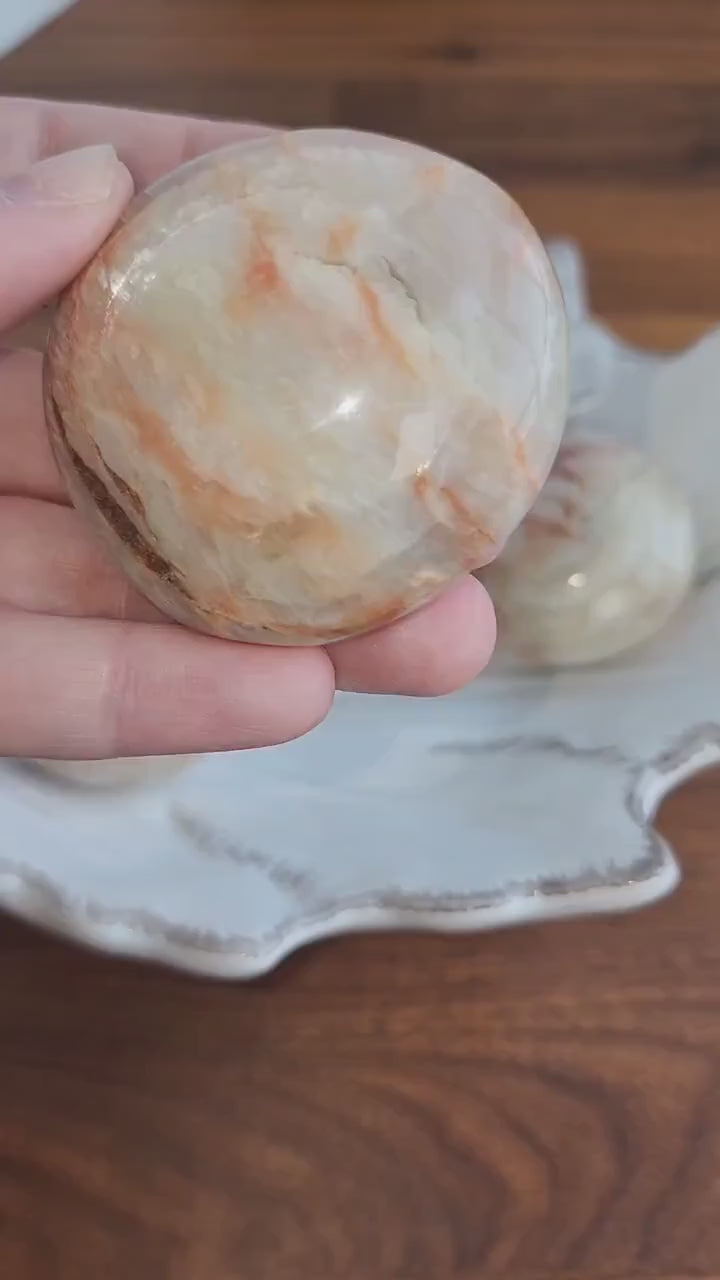 Cream Moonstone Palm Stone: Flashy Peach Pocket Stone