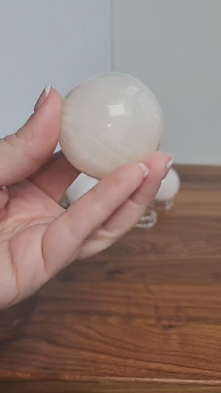 Pink Mangano Calcite Sphere: UV Reactive Crystal, Heart Chakra