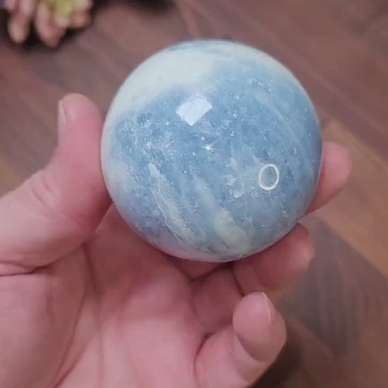 Blue Calcite Sphere: 69mm Crystal with White Quartz Swirls