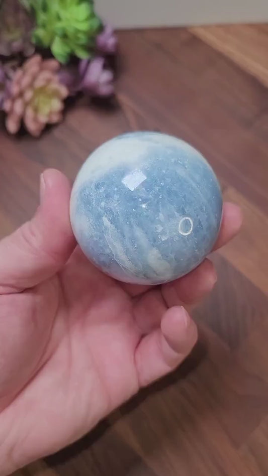 Blue Calcite Sphere: 69mm Crystal with White Quartz Swirls