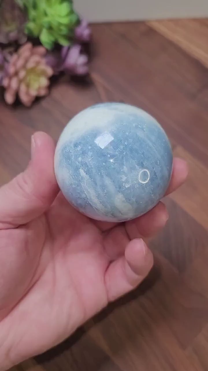 Blue Calcite Sphere: 69mm Crystal with White Quartz Swirls