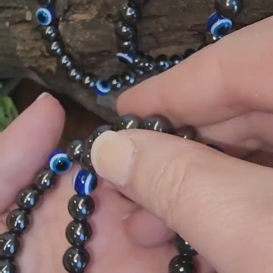 Evil Eye Hematite Bracelet: 8MM Tera Hertz Beads with Blue & Black Protection Charms