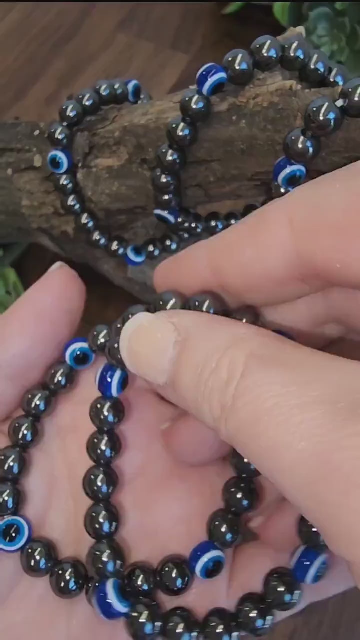 Evil Eye Hematite Bracelet: 8MM Tera Hertz Beads with Blue & Black Protection Charms