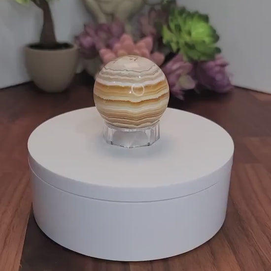Calcite Crystal Sphere: Yellow, Orange, and White Banded - 43mm
